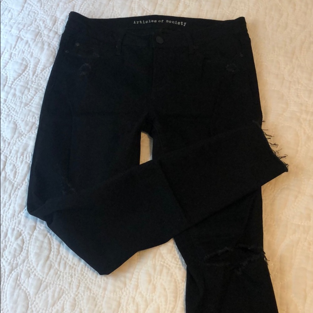 black ripped jeans